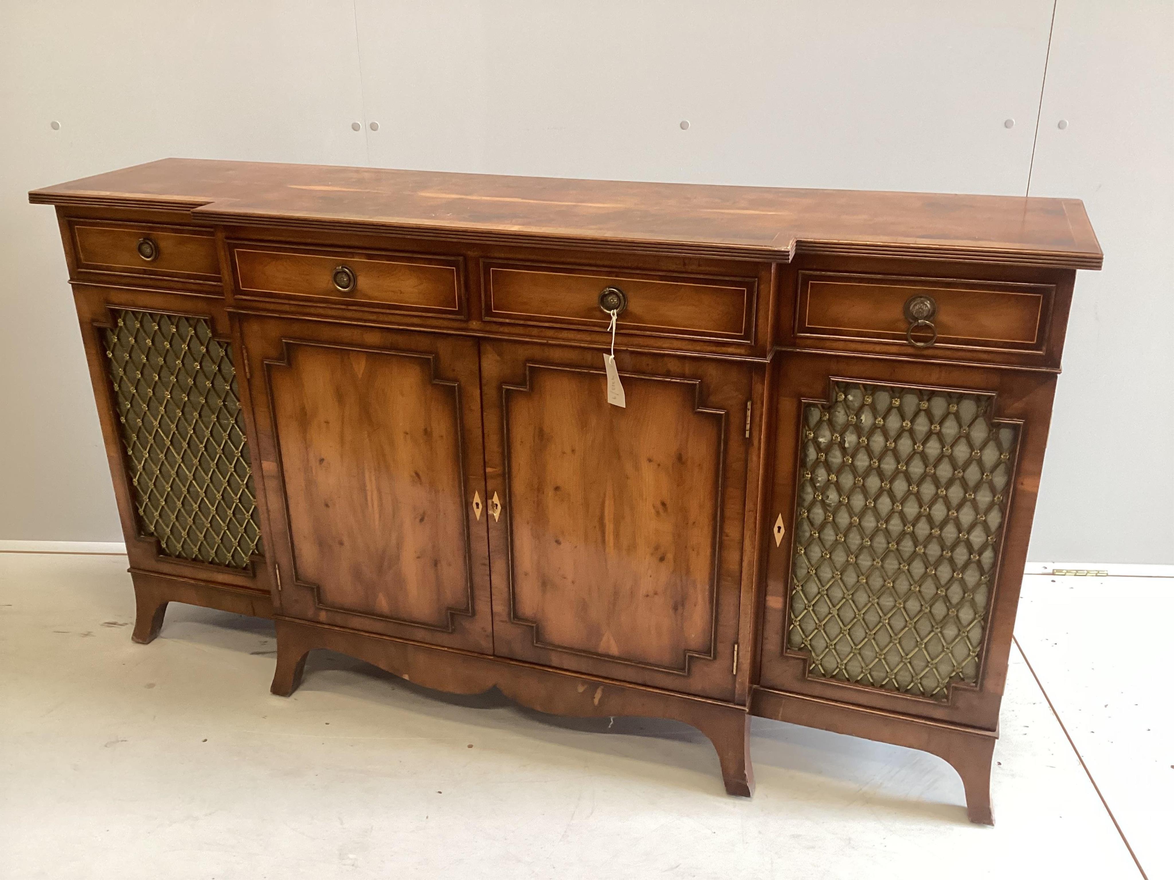 A reproduction yew breakfront side cabinet, width 153cm, depth 38cm, height 84cm. Condition - fair